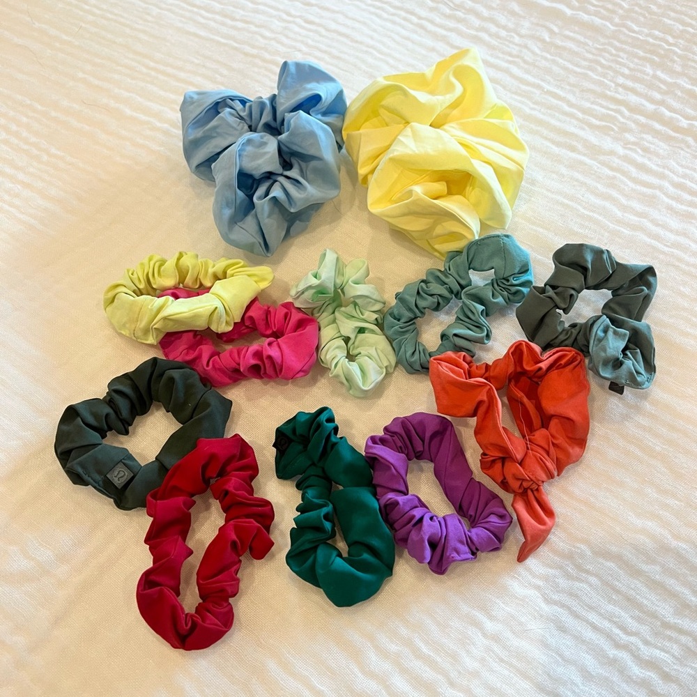Assortment of lululemon and Alo Yoga scrunchies